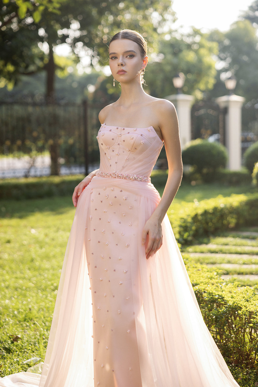 Strapless Dress with Sculpted Cat-Ear Bodice and Tulle Panels Light Pink / US 20 Strapless Dress with Sculpted Cat-Ear Bodice and Tulle Panels Light Pink / US 20