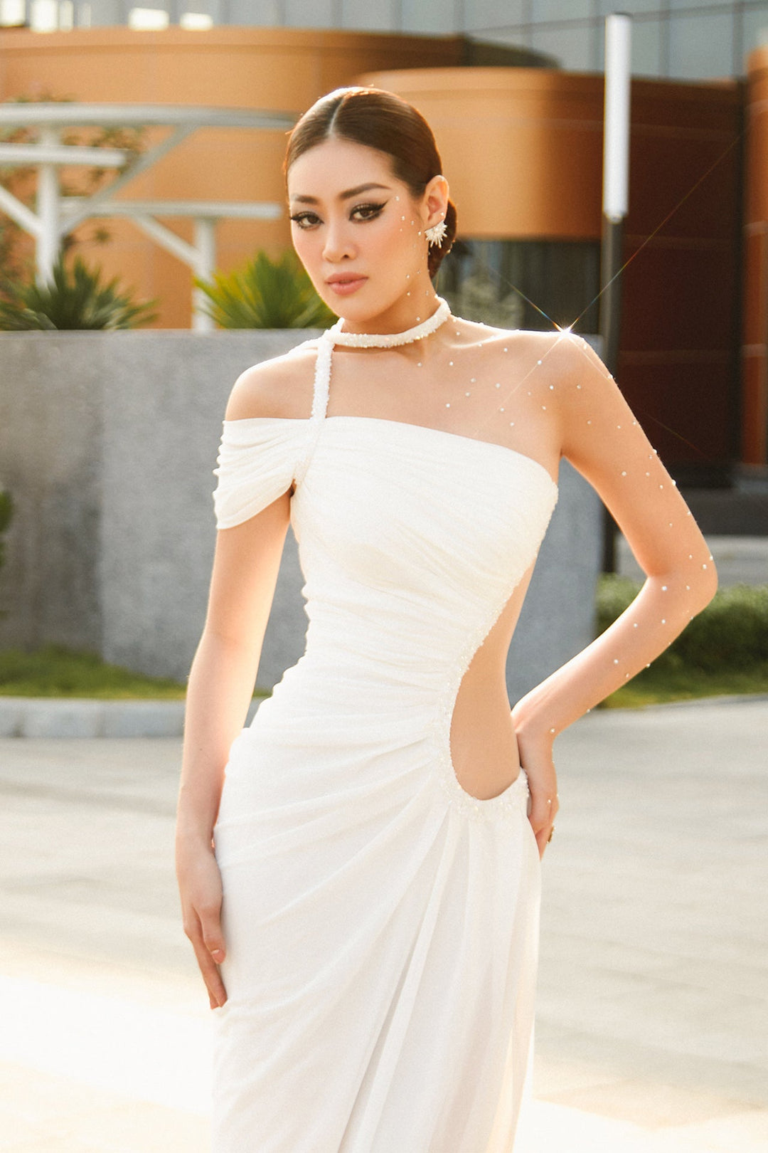 One-Shoulder White Gown with Waist Cutouts and High Slit