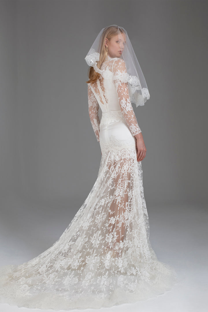 Slip-Style Wedding Dress with V-Neckline, Fitted Bodice, Long Pleated Skirt, and Floral Lace