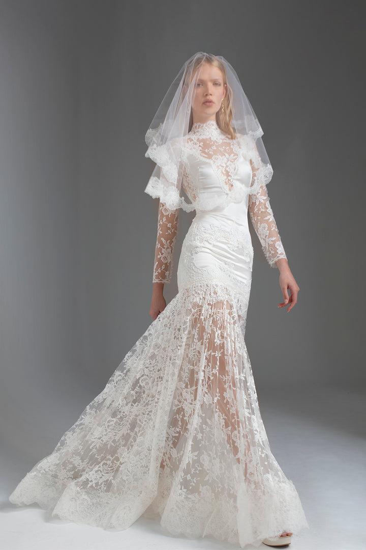 Slip-Style Wedding Dress with V-Neckline, Fitted Bodice, Long Pleated Skirt, and Floral Lace