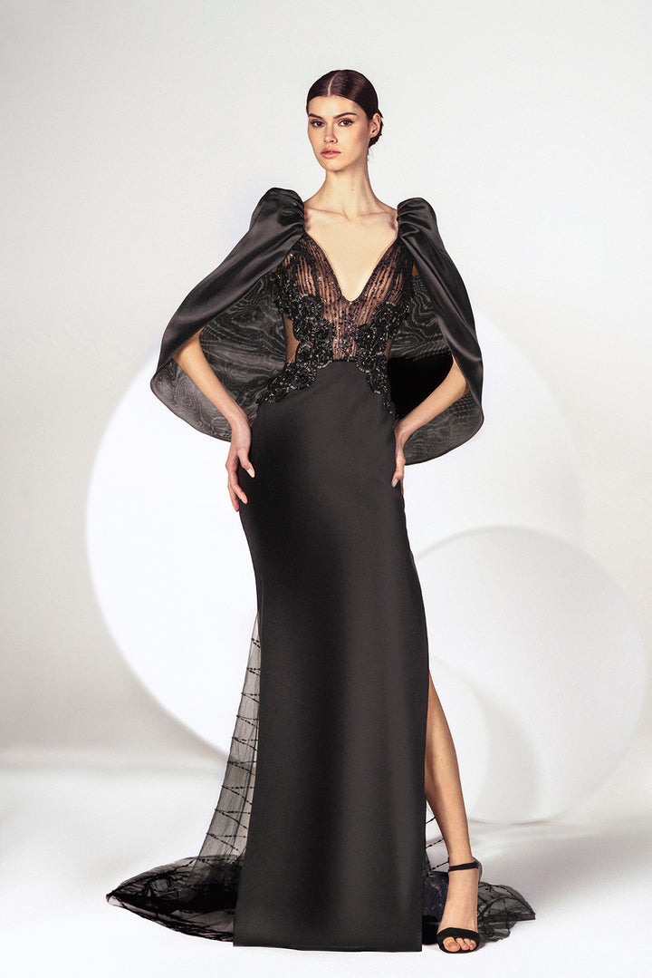 Black crepe dress with an Organza cape and tulle train