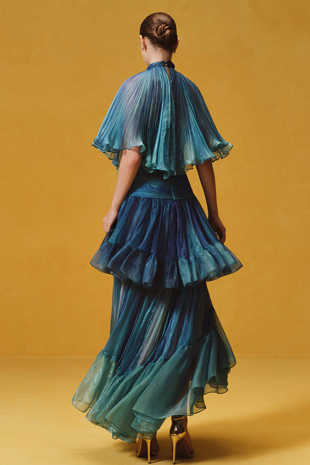 Asymmetrical Cape with Tiered Pleated Dress