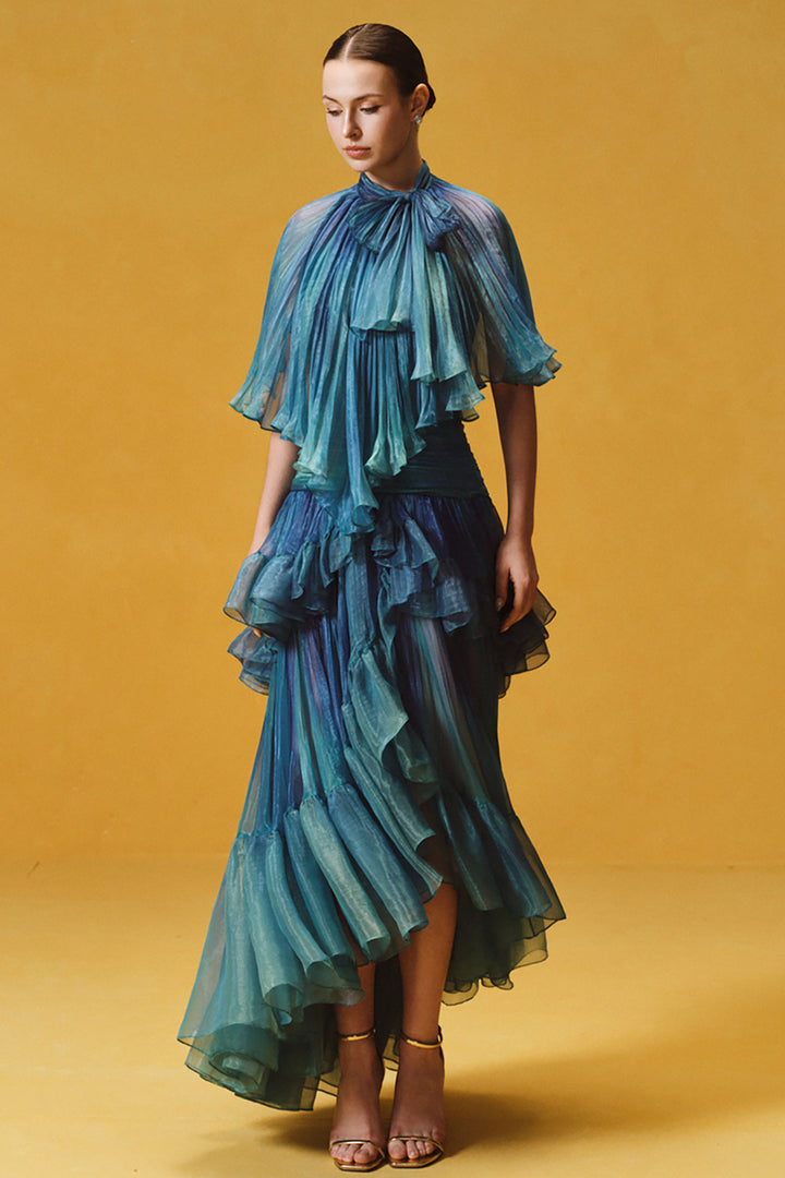 Asymmetrical Cape with Tiered Pleated Dress