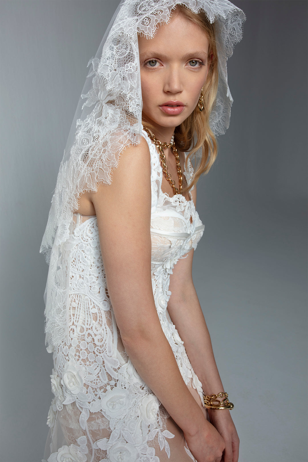 Fitted Wedding Dress with Corset Bustier Bodice, Floral Appliqus, and M.R DESIGN Fitted Wedding Dress with Corset Bustier Bodice, Floral Appliqus, and M.R DESIGN
