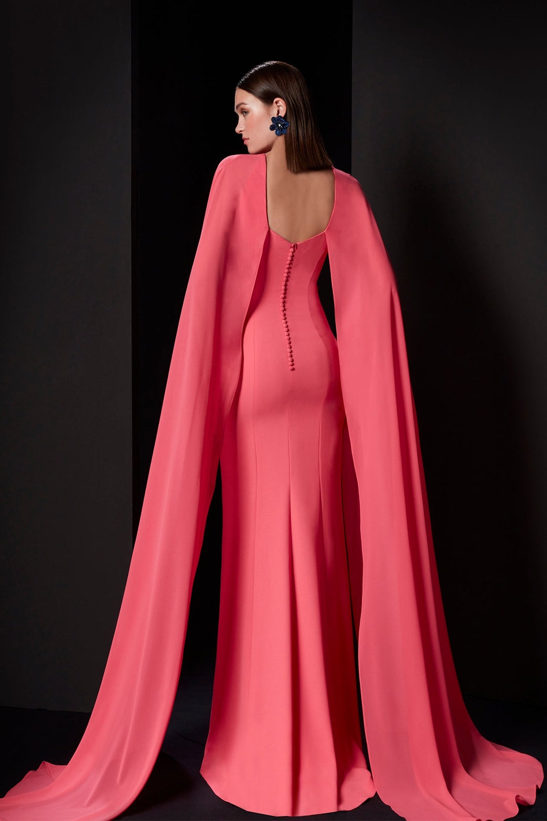 Pink Dress with Keyhole Detail and Flowing Cape Sleeves