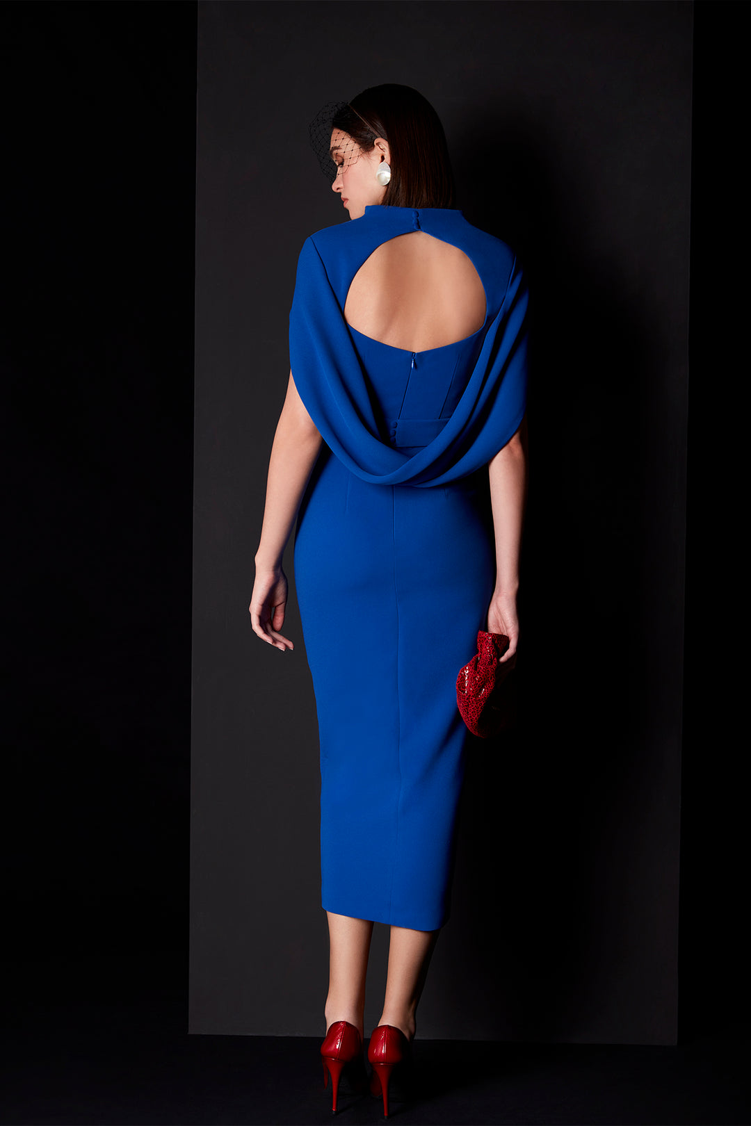 Midi-Length Cocktail Dress with V-Neckline and Peplum Detail