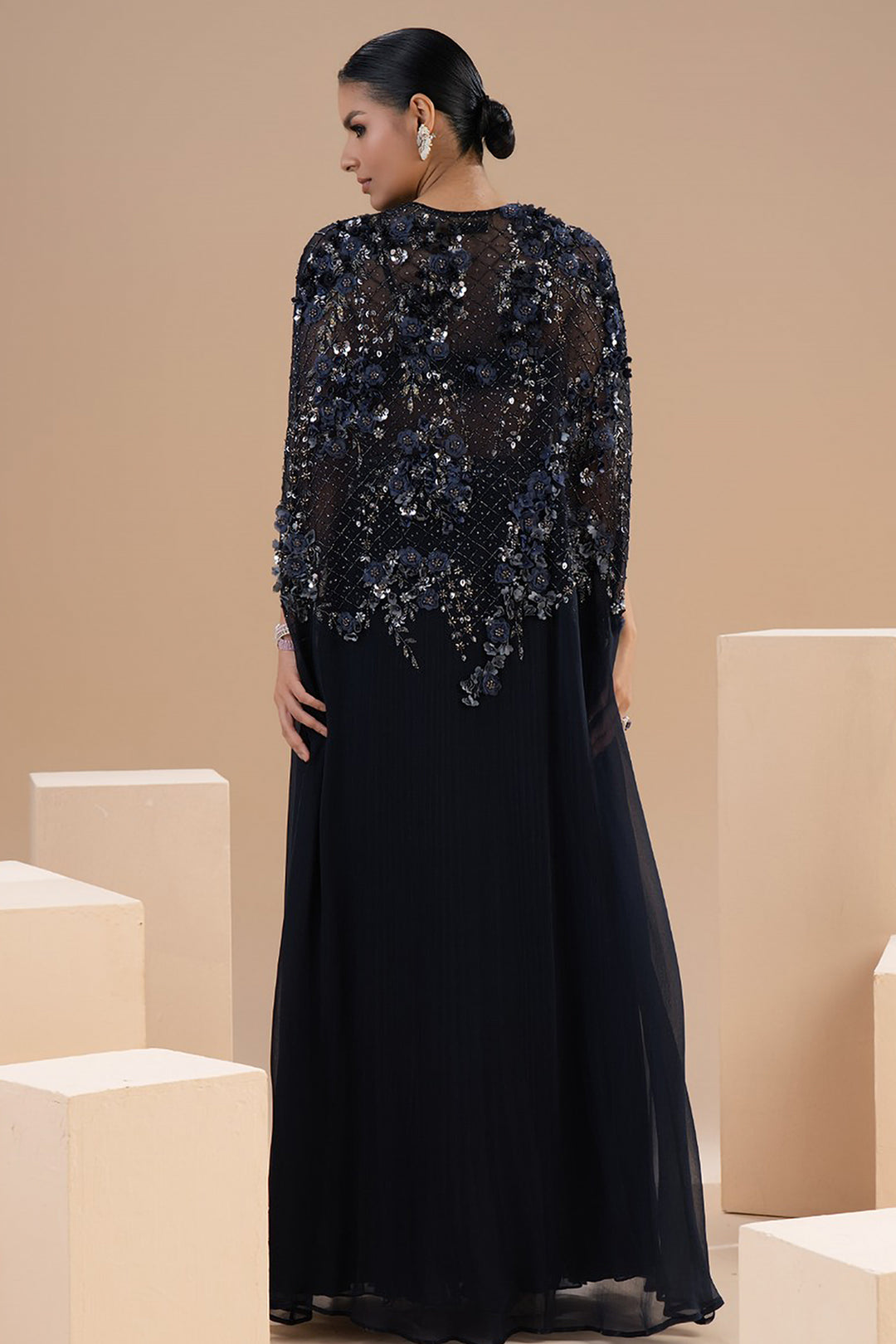Ethereal Laser-Cut Dress with Flowing Artistry