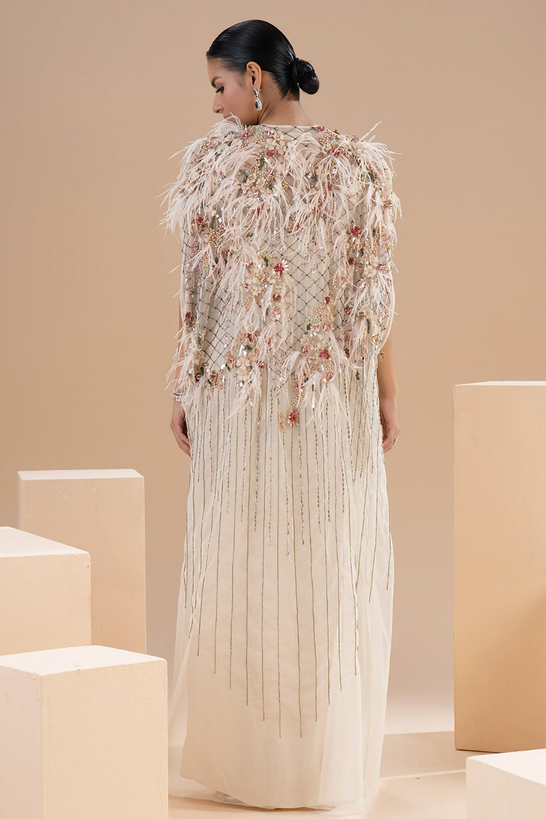 Playful Knots with Embroidered Capes