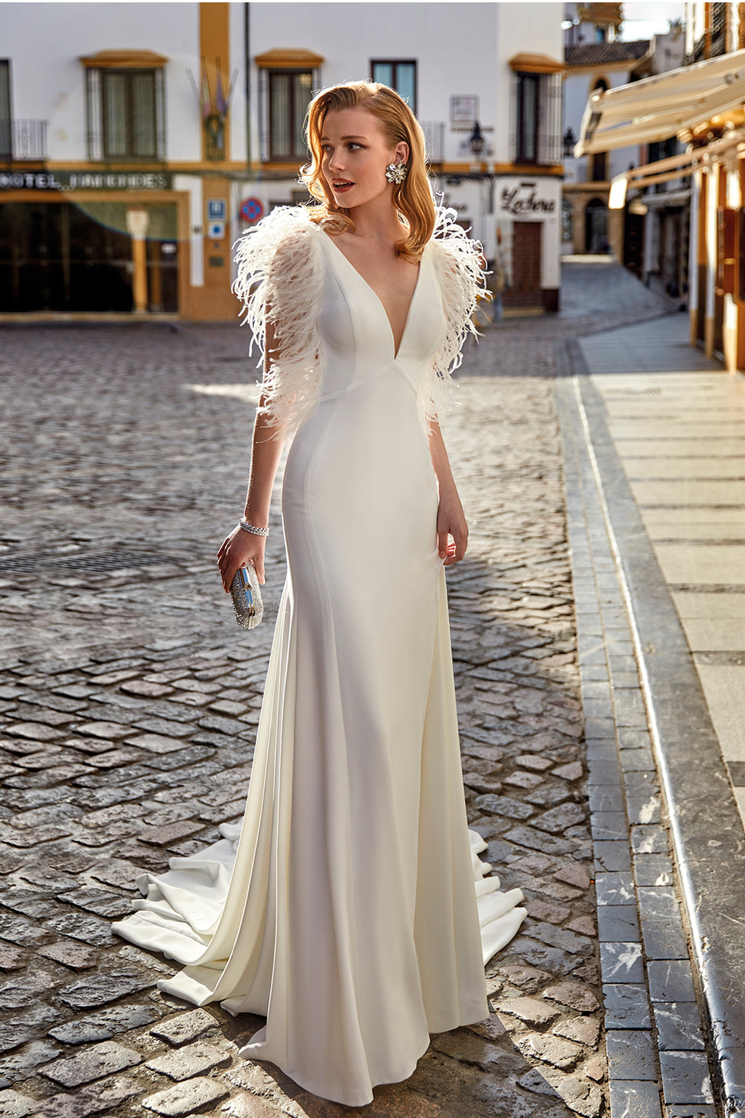 White Gown with Dramatic Feathered Sleeves and Plunging Neckline White / FR 44 White Gown with Dramatic Feathered Sleeves and Plunging Neckline White / FR 44