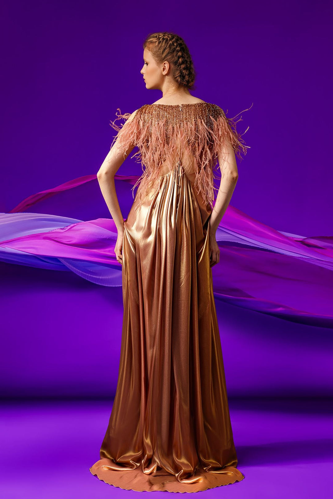 Lurex dress featuring feathers.