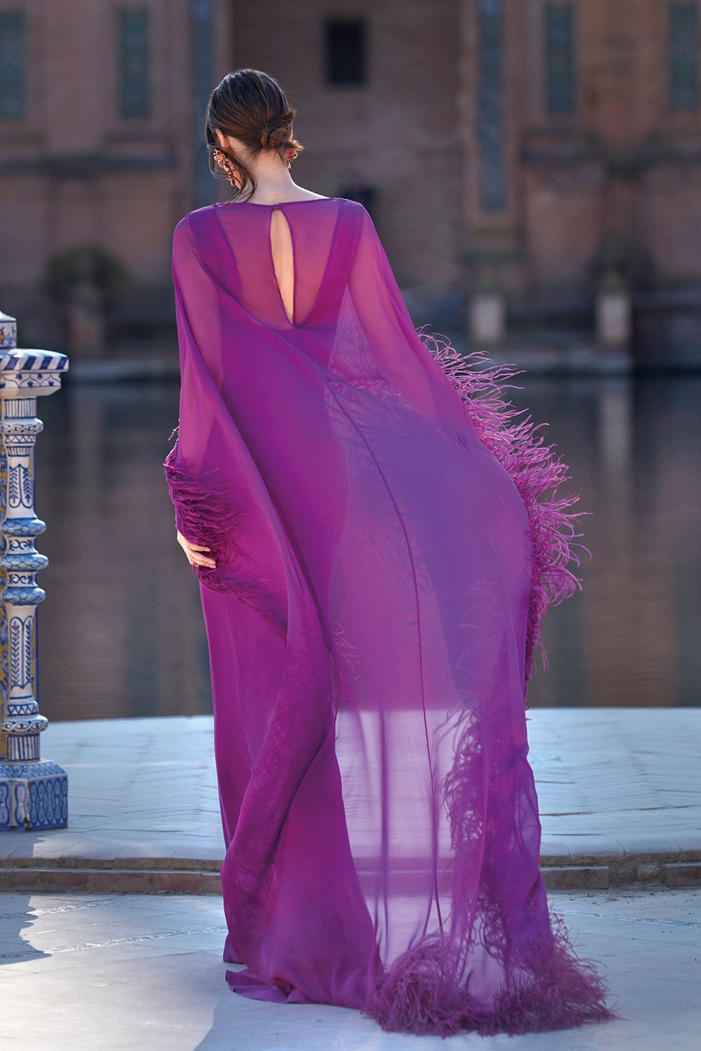 Mermaid crepe dress with feathered cape