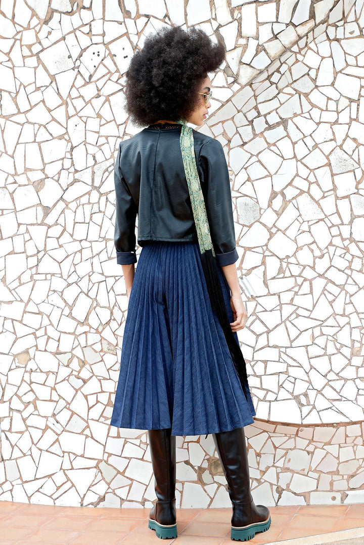 Fishnet Body, Pleated Skirt, and Leather Jacket